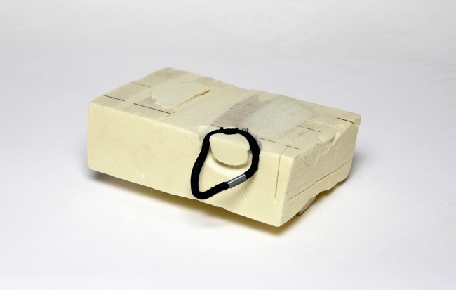 Nikki Woolsey - Holder,<br />foam, hair elastic<br />(2013)<br />